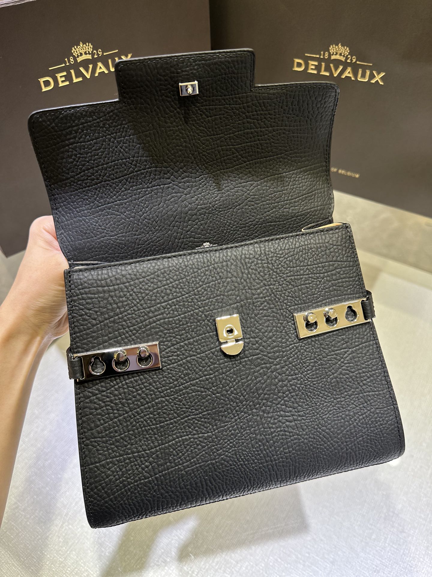 Delvaux Tempete PM new size, cow neck black Tempete was designed in 1967 by the famous Belgian architect Paule Goethals for Delvaux's 1967 "Yachting" series Size: 21.5cm wide, 19cm high, 10cm deep. 5 Delvaux Tempete PM new size, cow neck black Tempete was designed in 1967 by the famous Belgian architect Paule Goethals for Delvaux's 1967 "Yachting" series Size: 21.5cm wide, 19cm high, 10cm deep. - Image 5