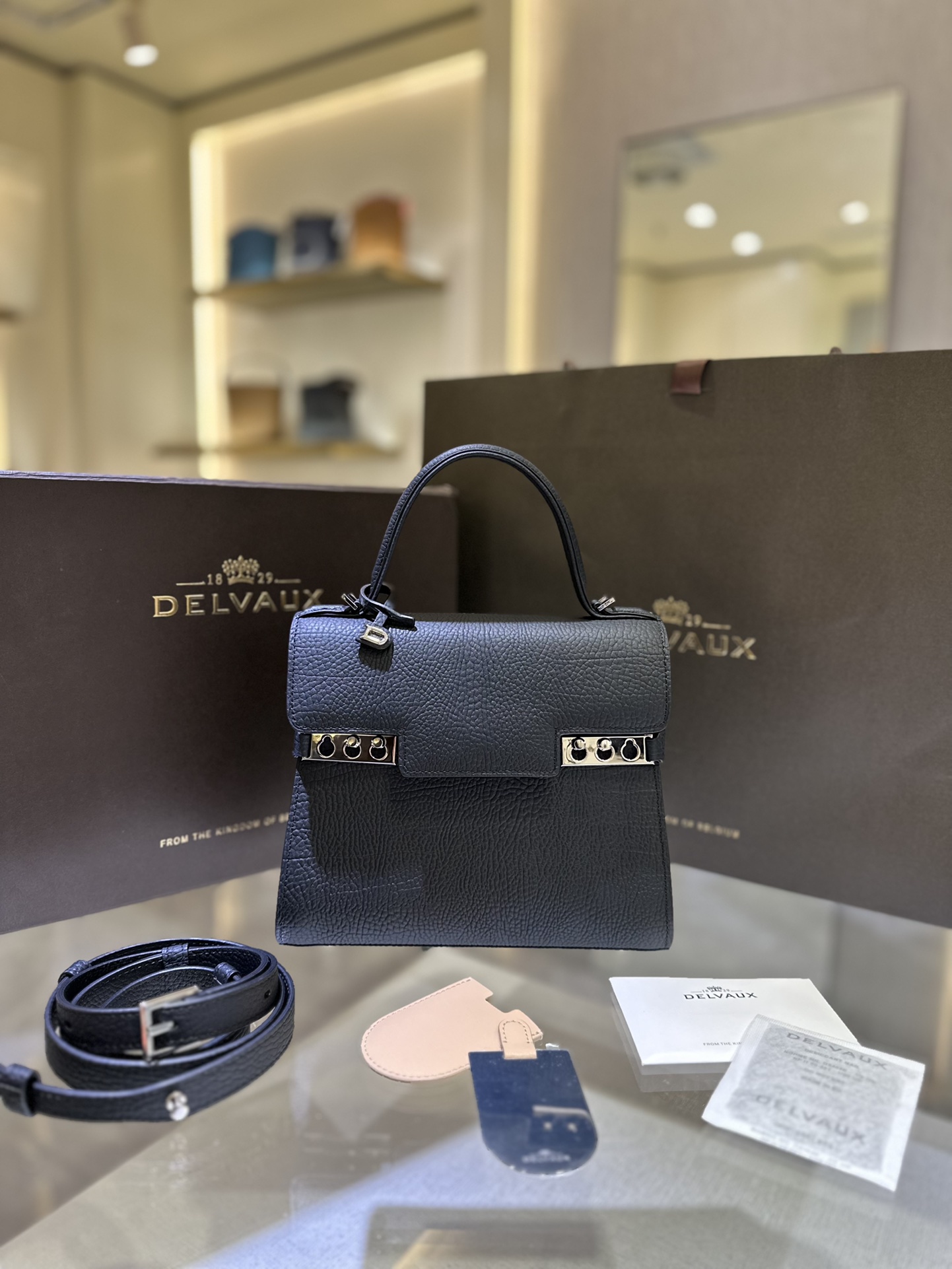 Delvaux Tempete PM new size, cow neck black Tempete was designed in 1967 by the famous Belgian architect Paule Goethals for Delvaux's 1967 "Yachting" series Size: 21.5cm wide, 19cm high, 10cm deep. 9 Delvaux Tempete PM new size, cow neck black Tempete was designed in 1967 by the famous Belgian architect Paule Goethals for Delvaux's 1967 "Yachting" series Size: 21.5cm wide, 19cm high, 10cm deep. - Image 9