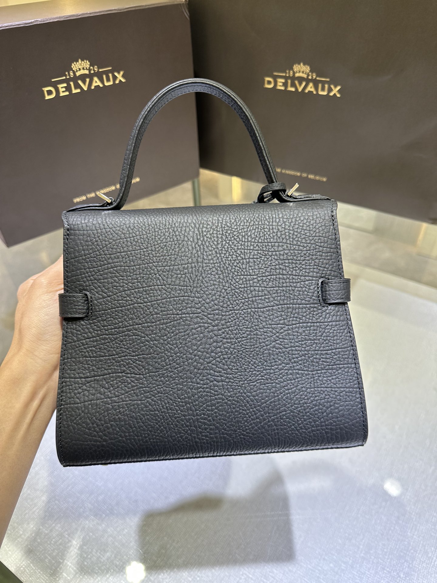 Delvaux Tempete PM new size, cow neck black Tempete was designed in 1967 by the famous Belgian architect Paule Goethals for Delvaux's 1967 "Yachting" series Size: 21.5cm wide, 19cm high, 10cm deep. 8 Delvaux Tempete PM new size, cow neck black Tempete was designed in 1967 by the famous Belgian architect Paule Goethals for Delvaux's 1967 "Yachting" series Size: 21.5cm wide, 19cm high, 10cm deep. - Image 8