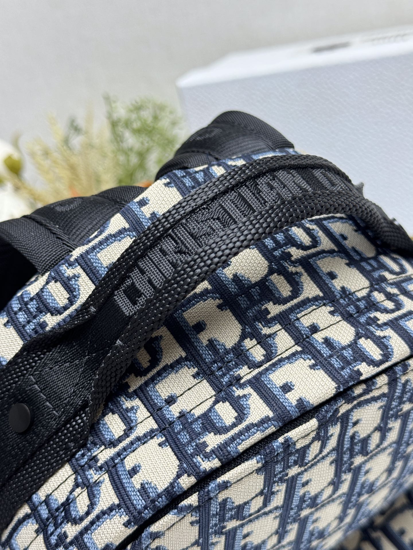 Dior Travel Backpack "Blue Cloth Small" This Travel backpack combines classic details with a stylish and practical design. Crafted from blue jacquard technical fabric, it features an all-over Oblique print and a striking Christian Paris signature on the front Dimensions: 23.5 x 32 x 11 cm (L x H x W) 7 Dior Travel Backpack "Blue Cloth Small" This Travel backpack combines classic details with a stylish and practical design. Crafted from blue jacquard technical fabric, it features an all-over Oblique print and a striking Christian Paris signature on the front Dimensions: 23.5 x 32 x 11 cm (L x H x W) - Image 7