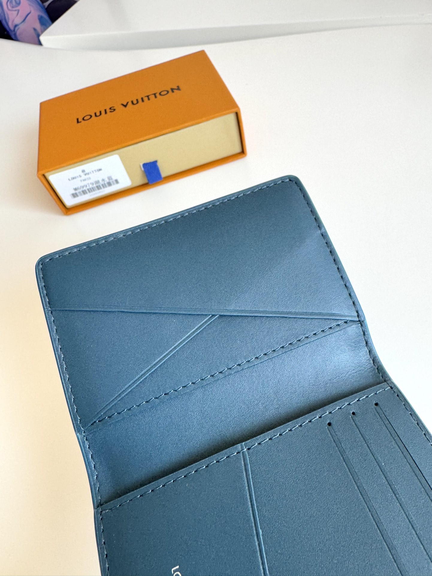 LV Aerogram Pocket Wallet is crafted from soft cowhide leather, reminiscent of vintage airmail letters Size: 11×8 cm 9 LV Aerogram Pocket Wallet is crafted from soft cowhide leather, reminiscent of vintage airmail letters Size: 11×8 cm - Image 9