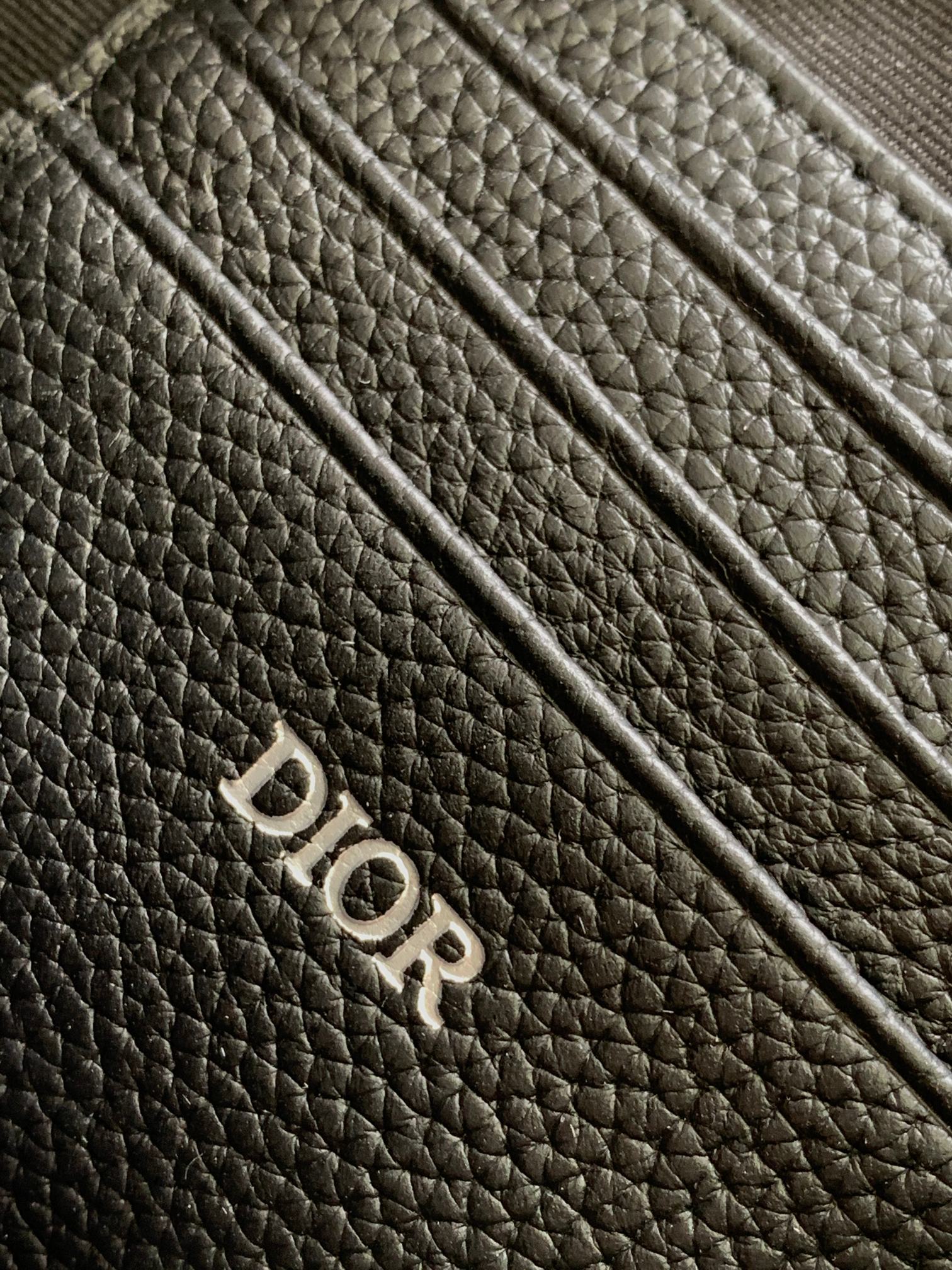 Dior Safari Messenger Bag Features & Materials: Main material: Beige and black Oblique print fabric Details: Black-grained calfskin leather accents Dimensions: 17 × 12.5 × 4 cm (L × H × W) Model number: 2ESWS011YKY_H27E 9 Dior Safari Messenger Bag Features & Materials: Main material: Beige and black Oblique print fabric Details: Black-grained calfskin leather accents Dimensions: 17 × 12.5 × 4 cm (L × H × W) Model number: 2ESWS011YKY_H27E - Image 9