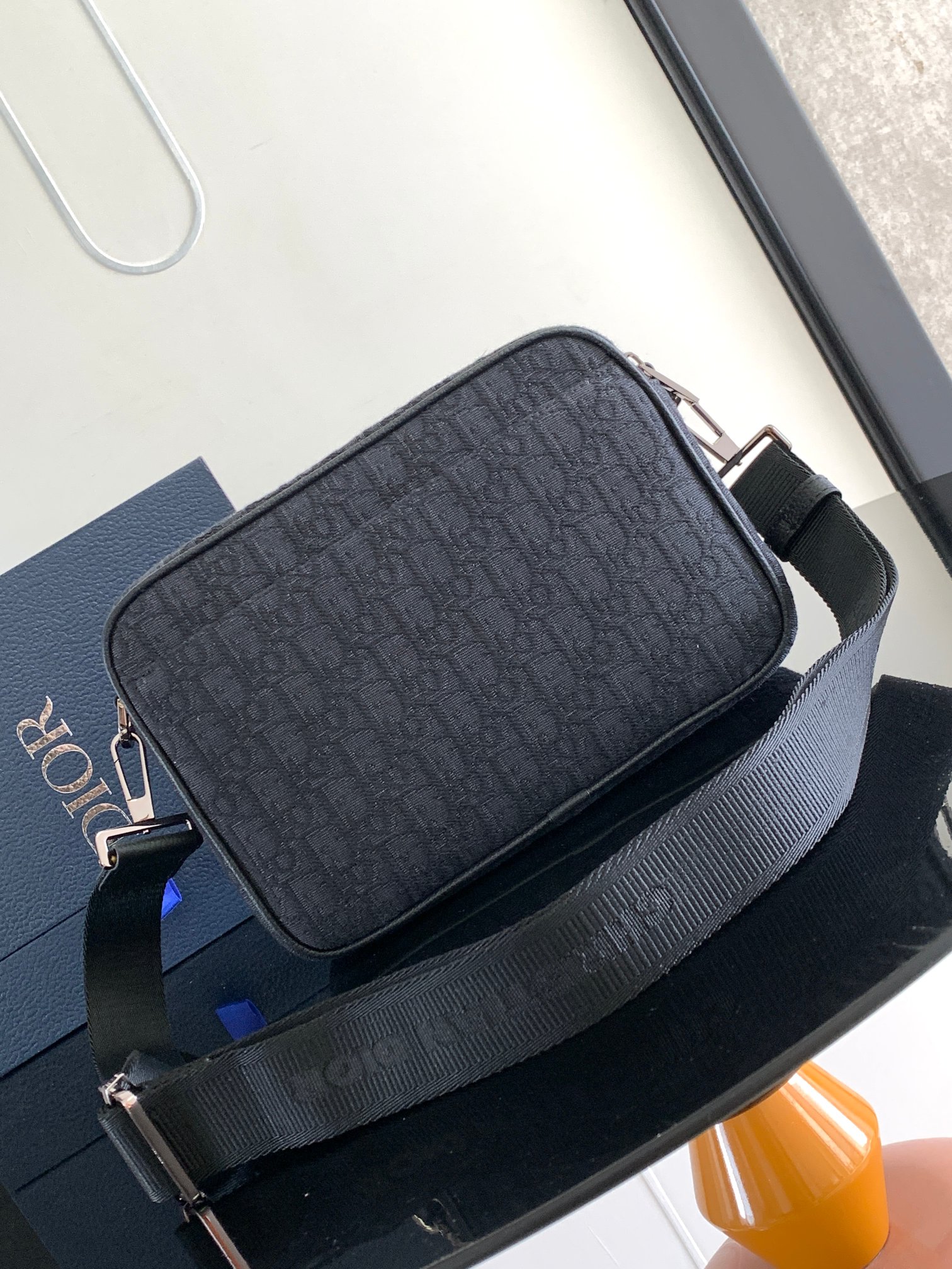 Dior Safari Messenger Bag Features & Materials: Main material: Beige and black Oblique print fabric Details: Black-grained calfskin leather accents Dimensions: 26 × 17 × 7 cm (L × H × W) Model number: 1ESPO297YKY_H27E (537743) 3 Dior Safari Messenger Bag Features & Materials: Main material: Beige and black Oblique print fabric Details: Black-grained calfskin leather accents Dimensions: 26 × 17 × 7 cm (L × H × W) Model number: 1ESPO297YKY_H27E (537743) - Image 3