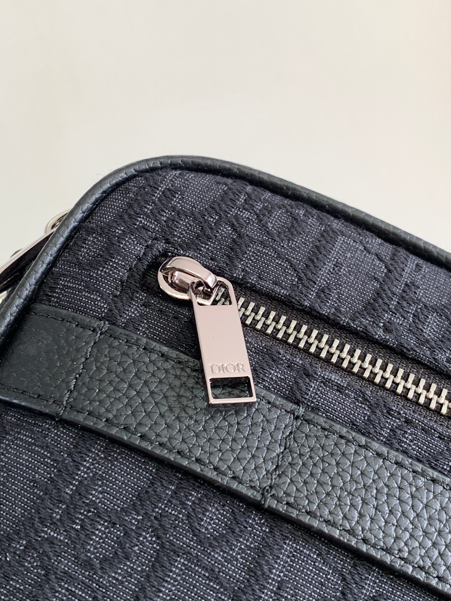Dior Safari Messenger Bag Features & Materials: Main material: Beige and black Oblique print fabric Details: Black-grained calfskin leather accents Dimensions: 26 × 17 × 7 cm (L × H × W) Model number: 1ESPO297YKY_H27E (537743) 6 Dior Safari Messenger Bag Features & Materials: Main material: Beige and black Oblique print fabric Details: Black-grained calfskin leather accents Dimensions: 26 × 17 × 7 cm (L × H × W) Model number: 1ESPO297YKY_H27E (537743) - Image 6