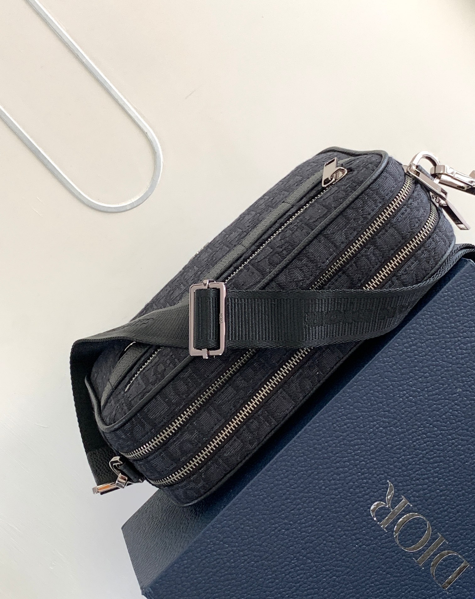 Dior Safari Messenger Bag Features & Materials: Main material: Beige and black Oblique print fabric Details: Black-grained calfskin leather accents Dimensions: 26 × 17 × 7 cm (L × H × W) Model number: 1ESPO297YKY_H27E (537743) 7 Dior Safari Messenger Bag Features & Materials: Main material: Beige and black Oblique print fabric Details: Black-grained calfskin leather accents Dimensions: 26 × 17 × 7 cm (L × H × W) Model number: 1ESPO297YKY_H27E (537743) - Image 7