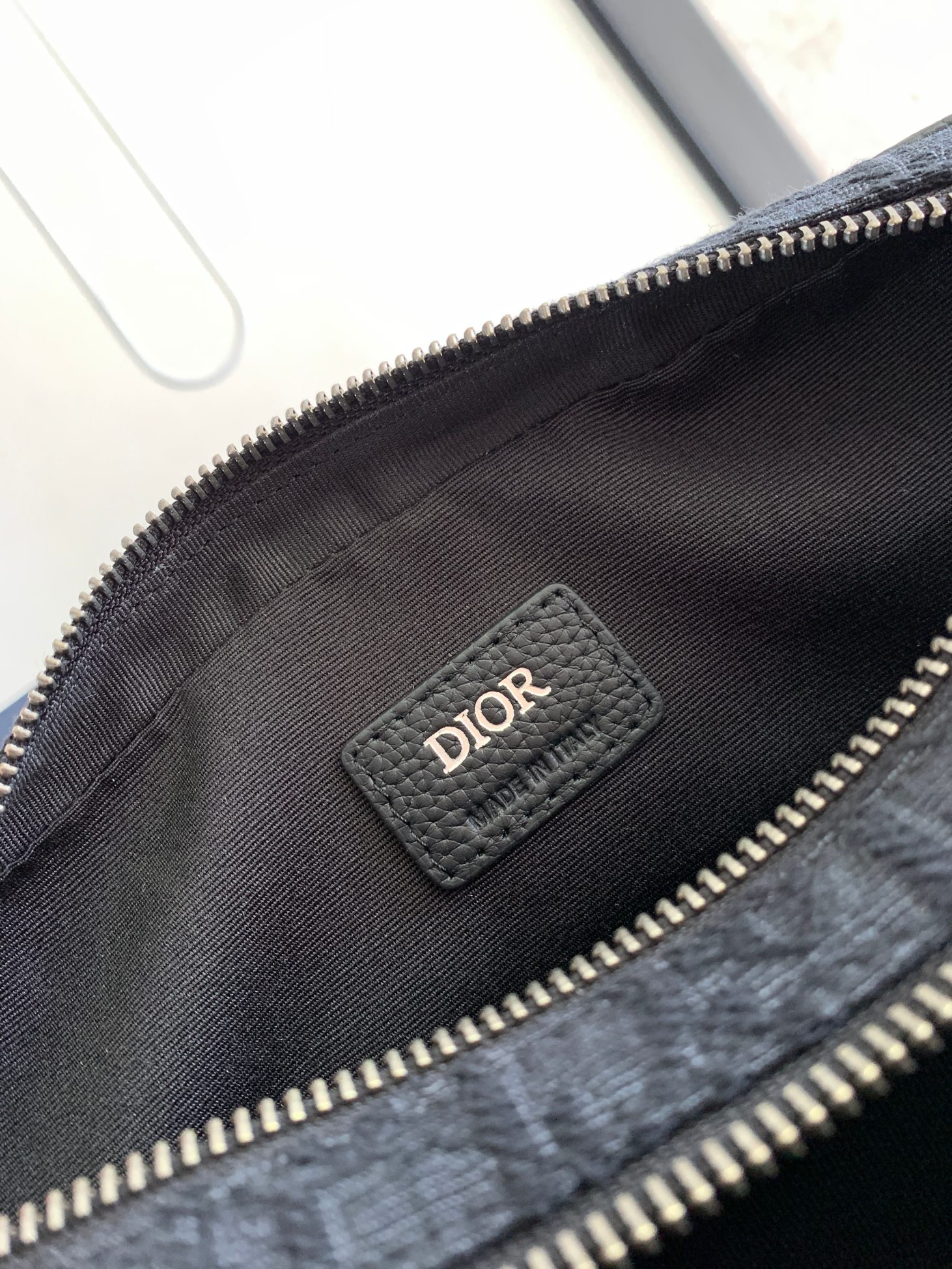 Dior Safari Messenger Bag Features & Materials: Main material: Beige and black Oblique print fabric Details: Black-grained calfskin leather accents Dimensions: 26 × 17 × 7 cm (L × H × W) Model number: 1ESPO297YKY_H27E (537743) 9 Dior Safari Messenger Bag Features & Materials: Main material: Beige and black Oblique print fabric Details: Black-grained calfskin leather accents Dimensions: 26 × 17 × 7 cm (L × H × W) Model number: 1ESPO297YKY_H27E (537743) - Image 9