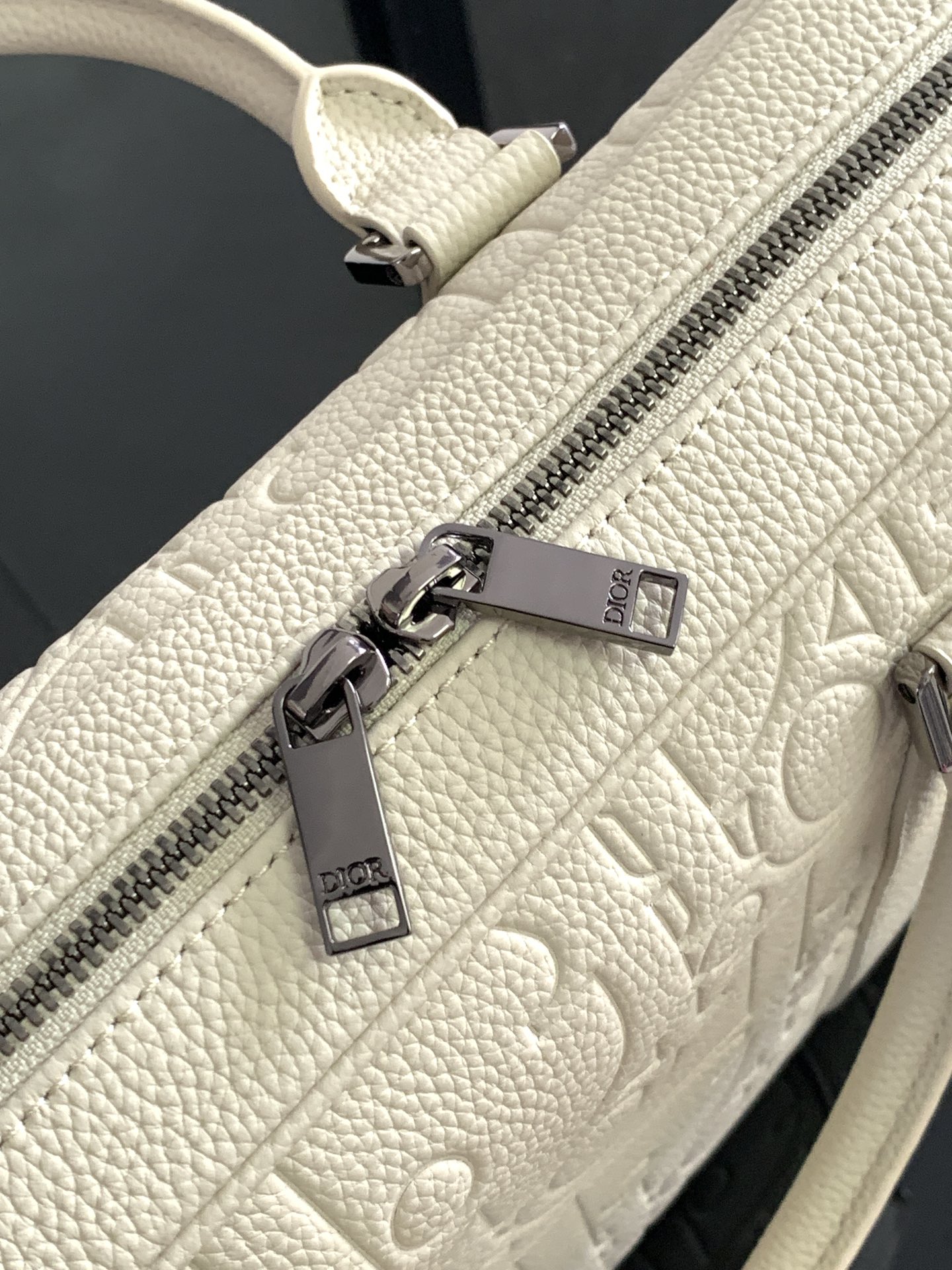 Dior Briefcase Main materials: Cotton, calfskin leather, and technical fabric Interior lining: Technical fabric, cotton, calfskin leather Dimensions: Size: 37 x 28 x 6 cm (L x H x W) Model number: 1ESBR180YKY_H03E 6 Dior Briefcase Main materials: Cotton, calfskin leather, and technical fabric Interior lining: Technical fabric, cotton, calfskin leather Dimensions: Size: 37 x 28 x 6 cm (L x H x W) Model number: 1ESBR180YKY_H03E - Image 6