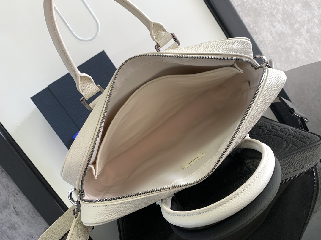 Dior Briefcase Main materials: Cotton, calfskin leather, and technical fabric Interior lining: Technical fabric, cotton, calfskin leather Dimensions: Size: 37 x 28 x 6 cm (L x H x W) Model number: 1ESBR180YKY_H03E 8 Dior Briefcase Main materials: Cotton, calfskin leather, and technical fabric Interior lining: Technical fabric, cotton, calfskin leather Dimensions: Size: 37 x 28 x 6 cm (L x H x W) Model number: 1ESBR180YKY_H03E - Image 8