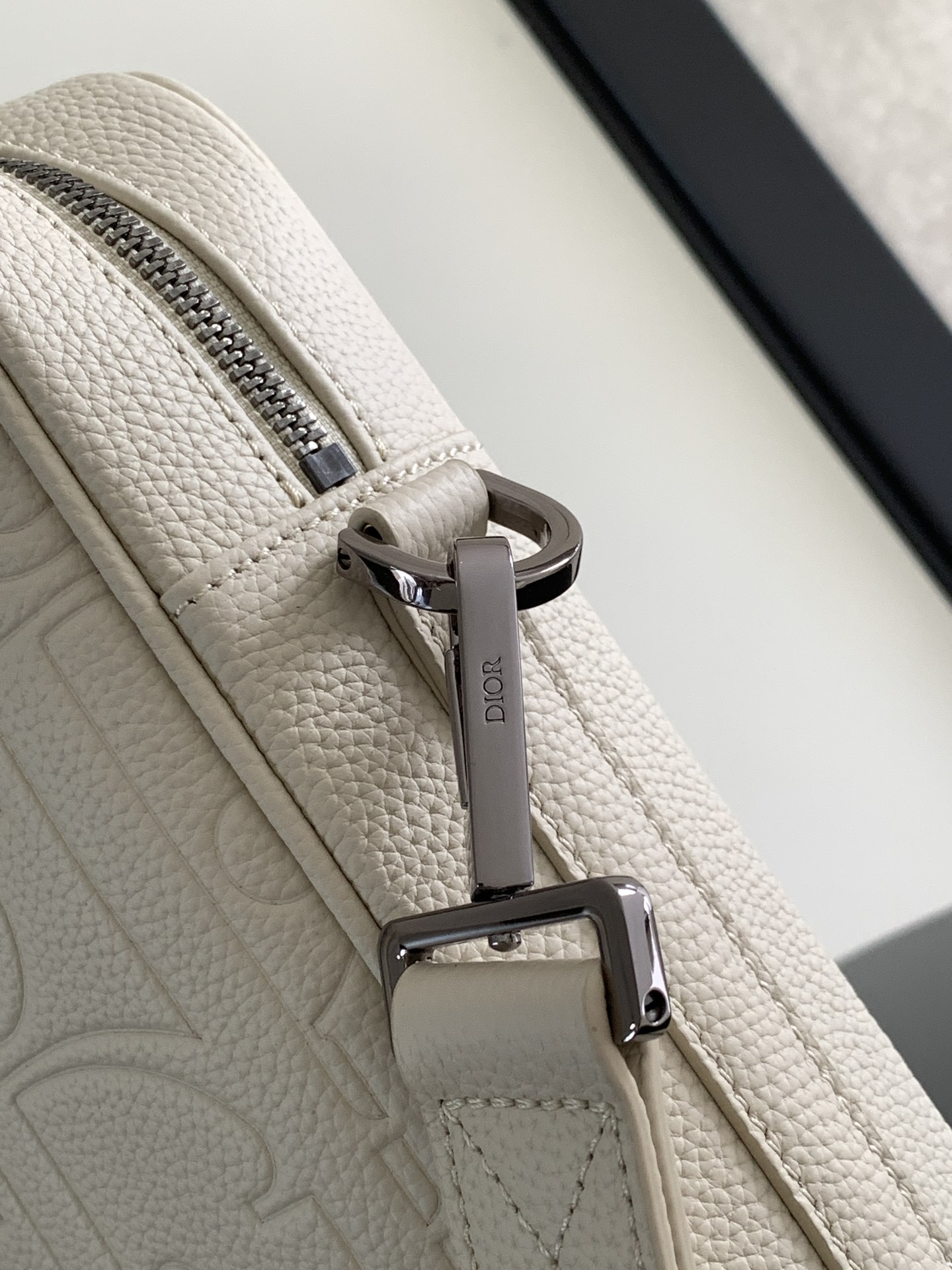Dior Briefcase Main materials: Cotton, calfskin leather, and technical fabric Interior lining: Technical fabric, cotton, calfskin leather Dimensions: Size: 37 x 28 x 6 cm (L x H x W) Model number: 1ESBR180YKY_H03E 7 Dior Briefcase Main materials: Cotton, calfskin leather, and technical fabric Interior lining: Technical fabric, cotton, calfskin leather Dimensions: Size: 37 x 28 x 6 cm (L x H x W) Model number: 1ESBR180YKY_H03E - Image 7