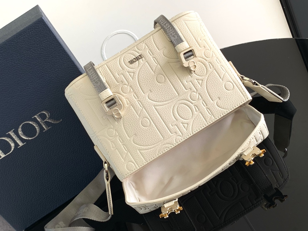 Dior Hit The Road collection Main material: Cotton, tech fabric, calfskin Lining: Tech fabric, cotton, calfskin Size: 24 x 18 x 8 cm Model number: EBA-1ESPO333YKY_H27E 5 Dior Hit The Road collection Main material: Cotton, tech fabric, calfskin Lining: Tech fabric, cotton, calfskin Size: 24 x 18 x 8 cm Model number: EBA-1ESPO333YKY_H27E - Image 5