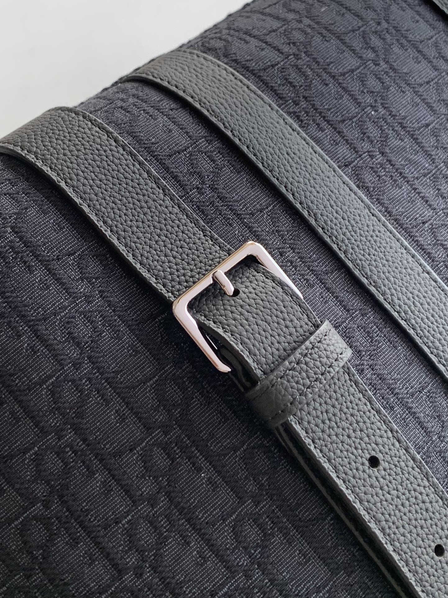 Dior Weekender 40 Handbag Key Features: Main materials: Cotton, calfskin leather, and technical fabric Interior lining: Technical fabric, cotton, and calfskin leather Dimensions: Size: 57.5 x 34.5 x 22 cm (L x H x W) Model number: 1ESDU134YKY_H03E 6 Dior Weekender 40 Handbag Key Features: Main materials: Cotton, calfskin leather, and technical fabric Interior lining: Technical fabric, cotton, and calfskin leather Dimensions: Size: 57.5 x 34.5 x 22 cm (L x H x W) Model number: 1ESDU134YKY_H03E - Image 6