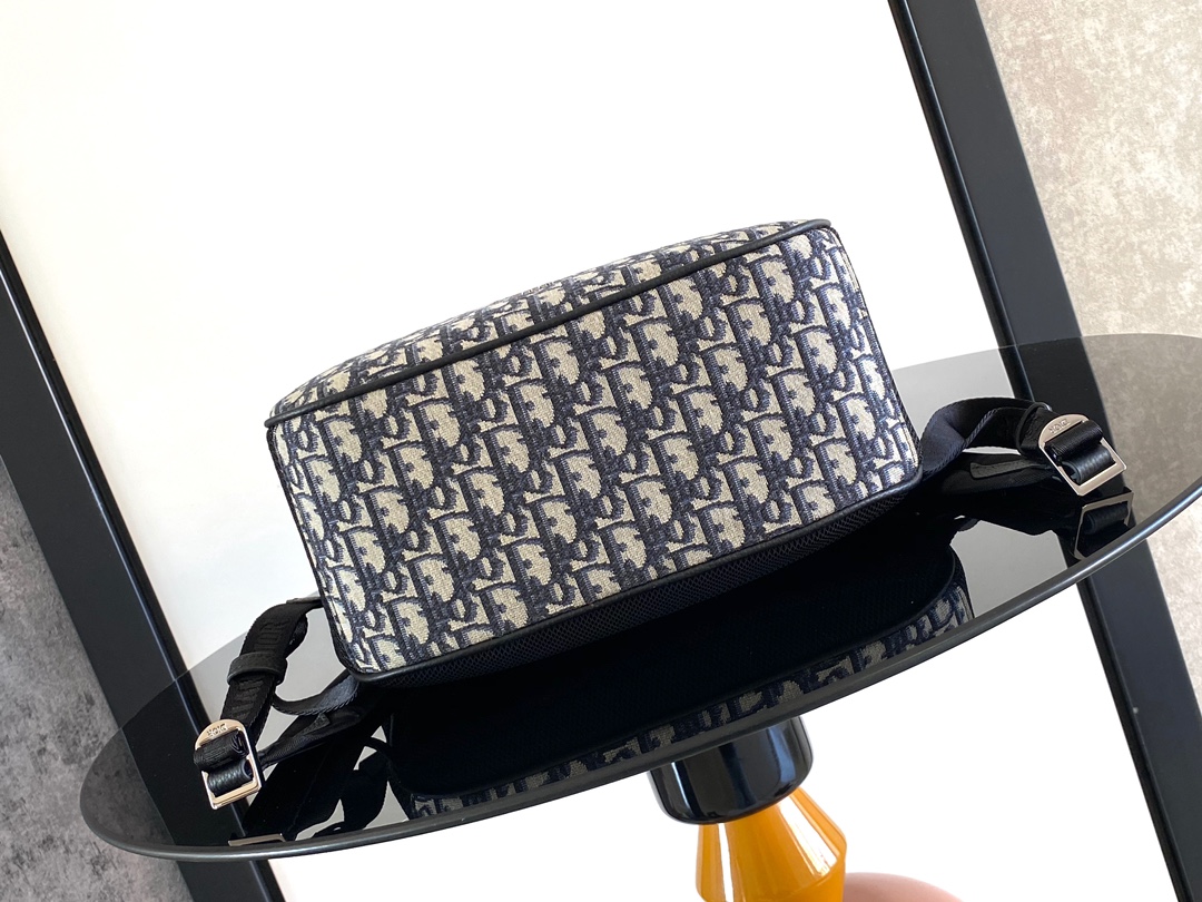 Dior 8 Roll-Top Backpack Main materials: Cotton, technical fabric, and calfskin leather Lining: Cotton, technical fabric, and calfskin leathery Dimensions: 39 × 42 × 13 cm (L × H × W) Model number: 1ESBA216YKY_H03E: 1ESBA216YKY_H03E 5 Dior 8 Roll-Top Backpack Main materials: Cotton, technical fabric, and calfskin leather Lining: Cotton, technical fabric, and calfskin leathery Dimensions: 39 × 42 × 13 cm (L × H × W) Model number: 1ESBA216YKY_H03E: 1ESBA216YKY_H03E - Image 5