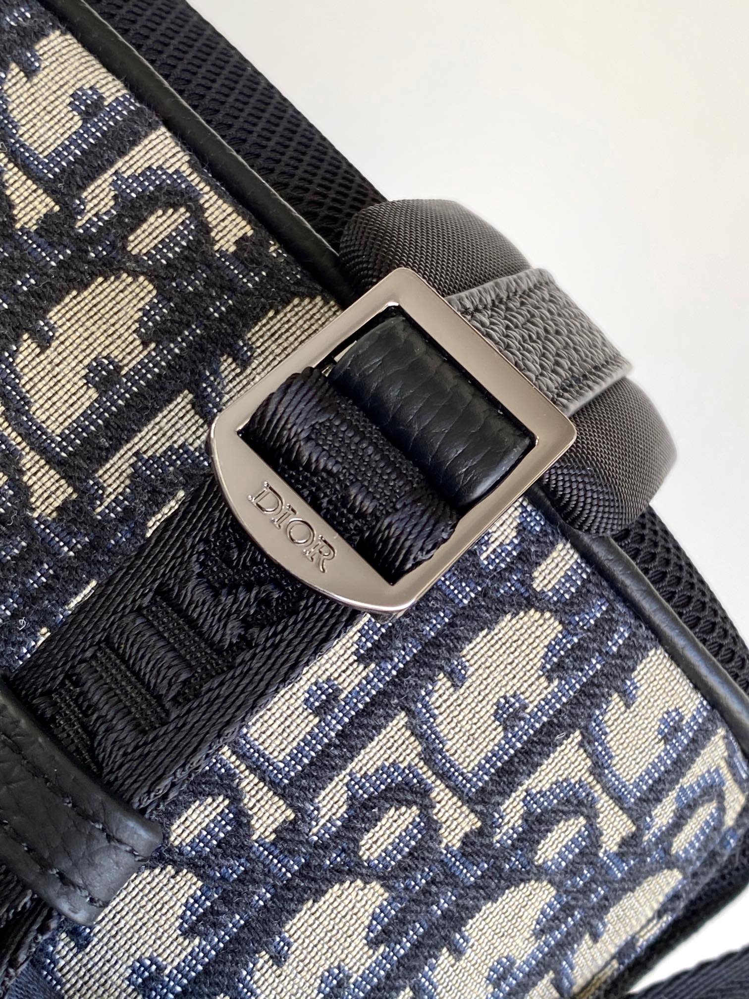 Dior 8 Roll-Top Backpack Main materials: Cotton, technical fabric, and calfskin leather Lining: Cotton, technical fabric, and calfskin leathery Dimensions: 39 × 42 × 13 cm (L × H × W) Model number: 1ESBA216YKY_H03E: 1ESBA216YKY_H03E 6 Dior 8 Roll-Top Backpack Main materials: Cotton, technical fabric, and calfskin leather Lining: Cotton, technical fabric, and calfskin leathery Dimensions: 39 × 42 × 13 cm (L × H × W) Model number: 1ESBA216YKY_H03E: 1ESBA216YKY_H03E - Image 6