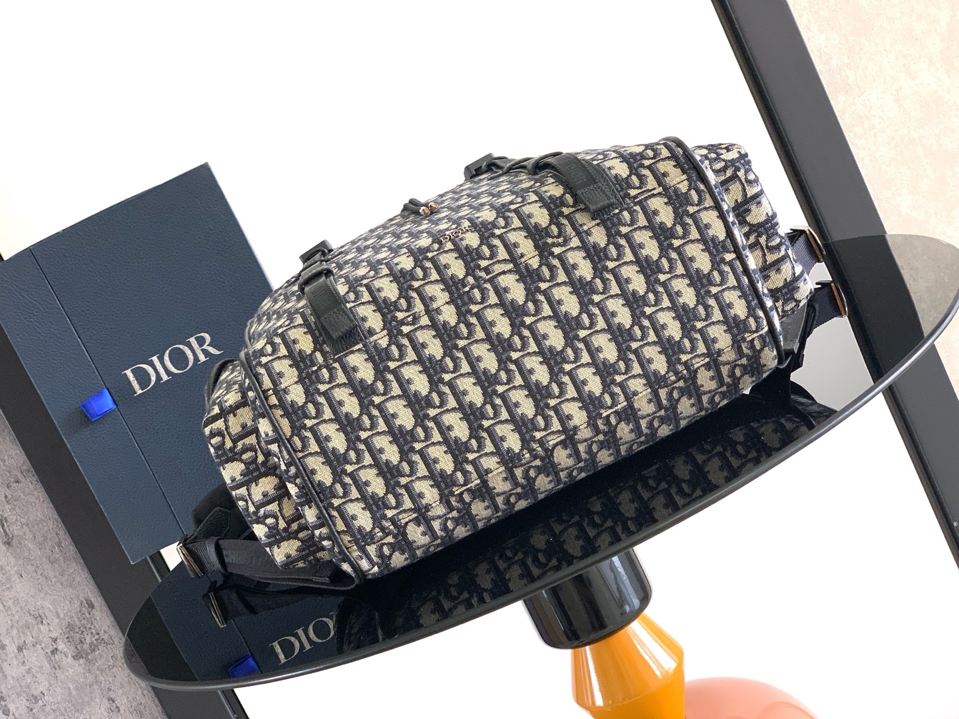 Dior Hit The Road Flap Backpack seamlessly blends modern style Crafted from beige Oblique printed fabric Size: 43 × 43 × 18 cm (L × H × W) Lining: Fabric (excluding trims and decorative stitching) Main compartment: Flap closure with drawstringModel number: FK-1ESBA205YKY_H03E 4 Dior Hit The Road Flap Backpack seamlessly blends modern style Crafted from beige Oblique printed fabric Size: 43 × 43 × 18 cm (L × H × W) Lining: Fabric (excluding trims and decorative stitching) Main compartment: Flap closure with drawstringModel number: FK-1ESBA205YKY_H03E - Image 4